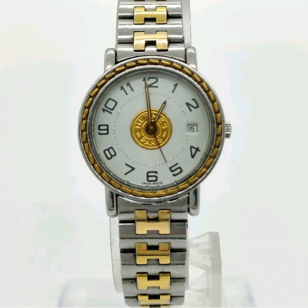 Hermes
Authentic Hermes Sellier woman watch
in gold and silver